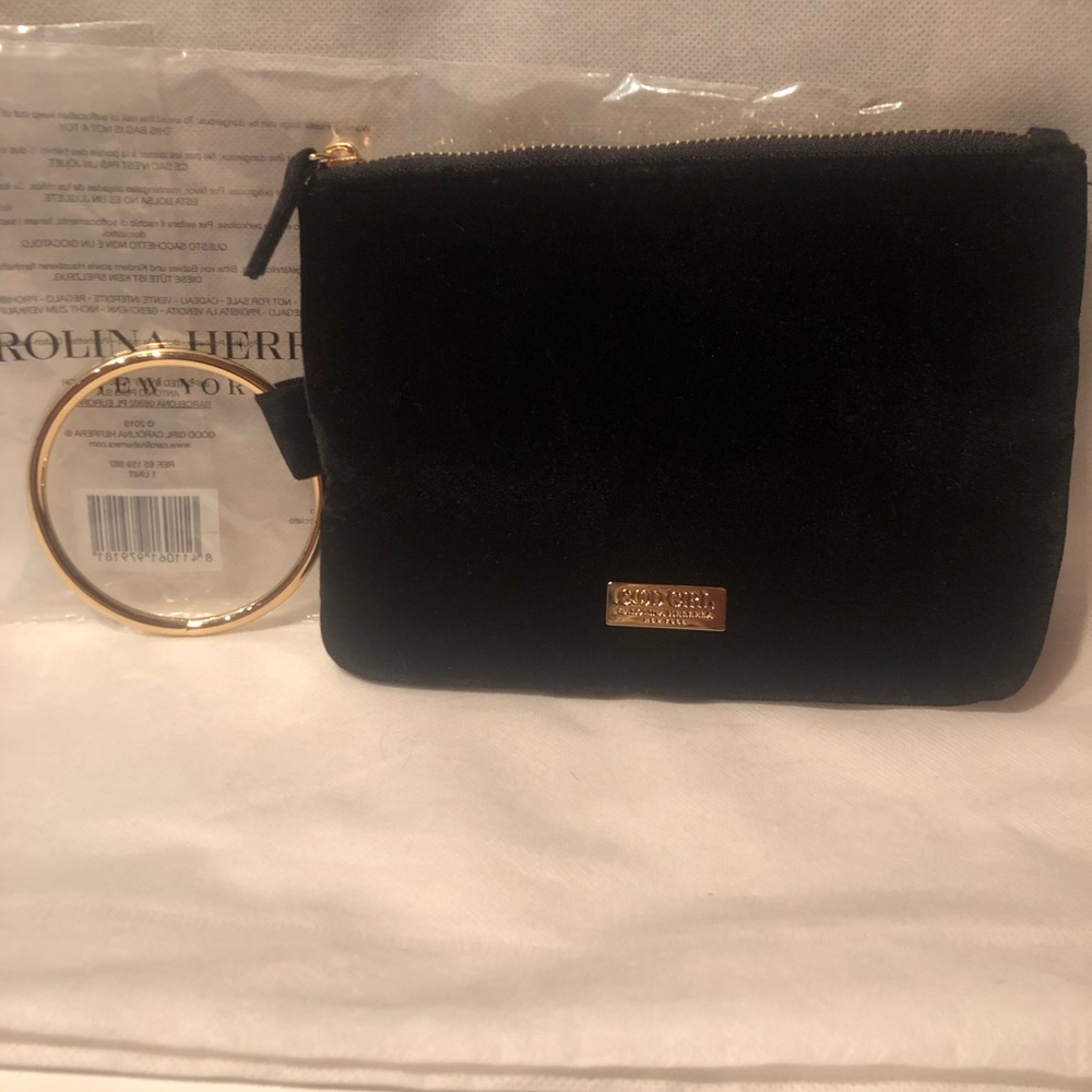 Gorgeous NWT Carolina Herrera Black Velvet Clutch with Gold tone Ring Handle